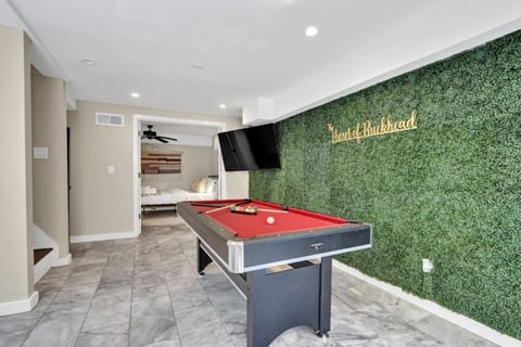 Enjoy a game of pool in your private suite downstairs—an exclusive feature for ultimate fun. 