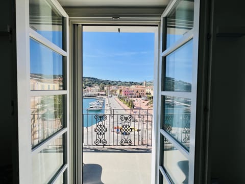 Breathtaking views all day long of the Marina and town of Porto Azzurro