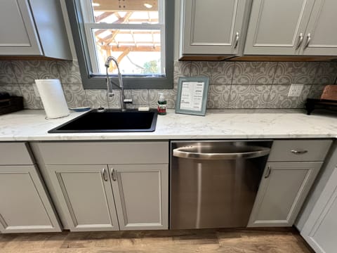 Dishwasher a large farm sink