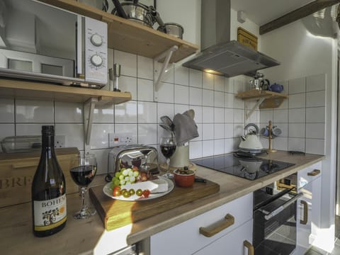 Welcome pack with cheese, grapes and wine