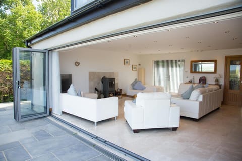 Patio and folding doors open into living area