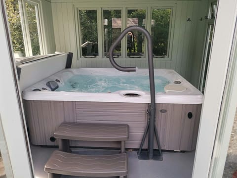 Hot tub in covered conservatory