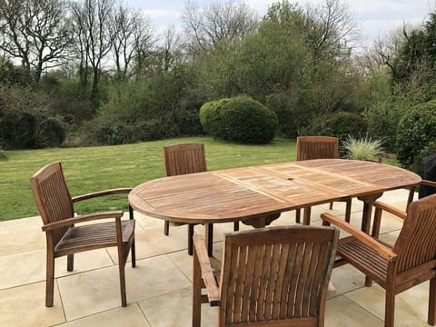Large terrace with wooden table and 6 chairs