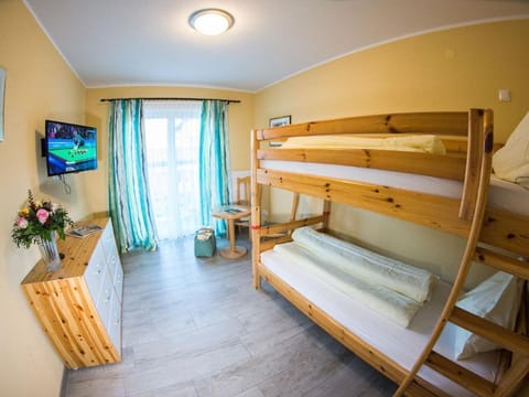 Familienzimmer Classic mit Balkon - Seehotel Steiner House in Spittal an der Drau