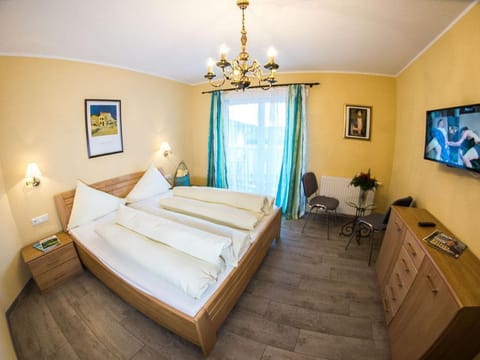 Familienzimmer Classic mit Balkon - Seehotel Steiner House in Spittal an der Drau