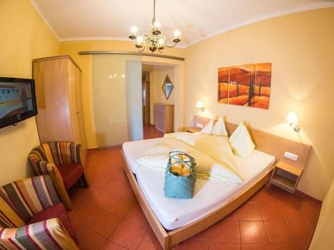 Familienzimmer Classic mit Balkon - Seehotel Steiner House in Spittal an der Drau