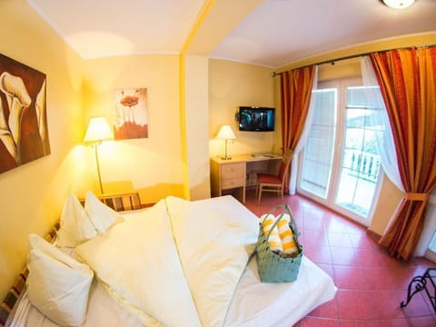 Familienzimmer Classic mit Balkon - Seehotel Steiner House in Spittal an der Drau