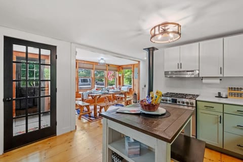 Open-concept kitchen connects seamlessly to dining and living spaces for easy entertaining.