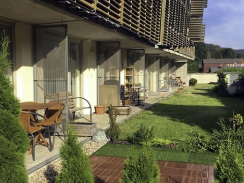 Plant, Building, Furniture, Table, Shade, Architecture, Urban Design, Chair, Interior Design, Grass