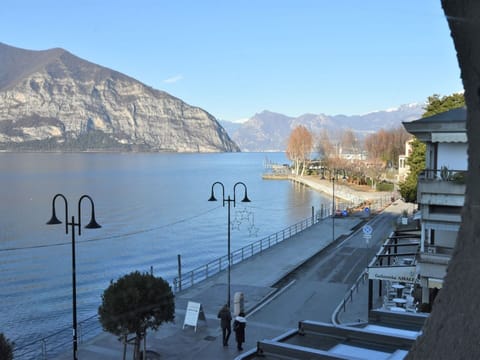 Water, Sky, Mountain, Azure, Lake, Body Of Water, Plant, Mountain Range, Mountainous Landforms