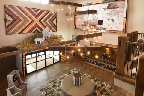 Soak in the dramatic atrium lobby with glowing pendant lights.