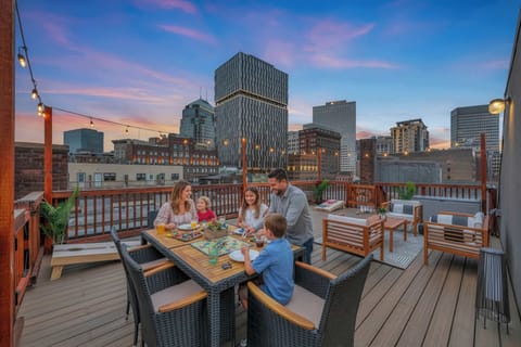 Relax and spend quality time on the rooftop with stunning city views.
