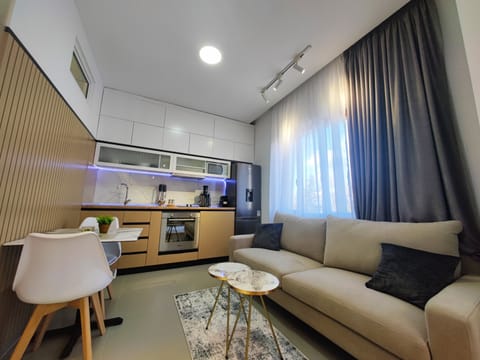 Stylish sitting area with warm lighting and wood details