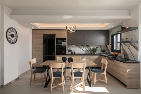 The open plan kitchen-dining area of Residence A.