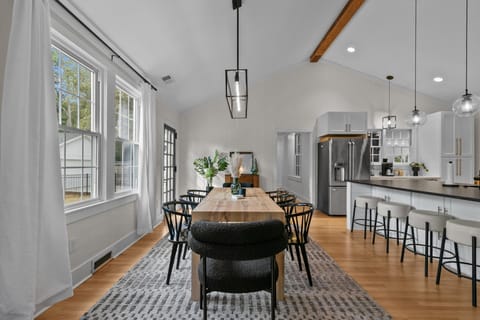 Large dining table and eat-at island. Plenty of seating for all.