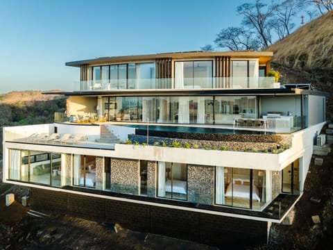 CAR drone front - Three stories of luxury and bliss