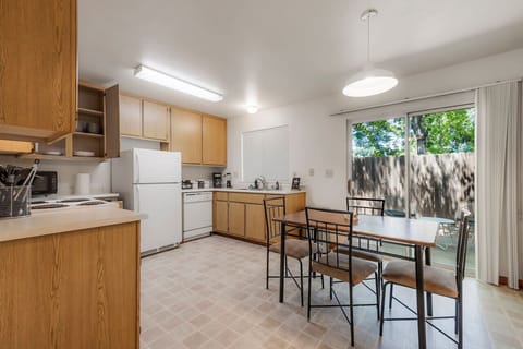 Fully equipped kitchen and dining space for home-cooked meals.