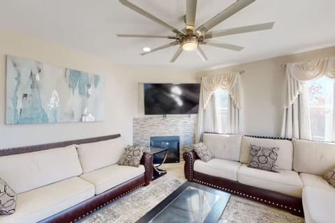 Bright, elegant living room with comfy seating