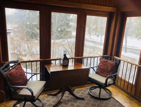 Sunroom/porch overlooking mill run creek & bark river