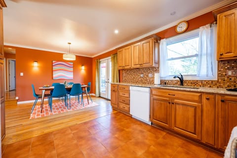 Open concept area featuring dining area and kitchen