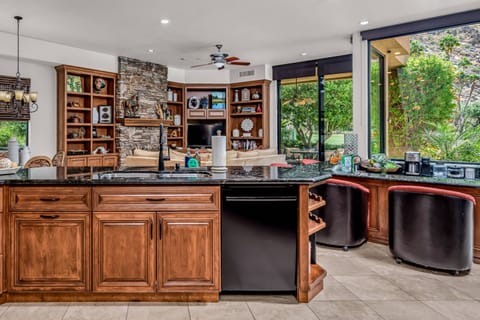 Living space connected to main kitchen and bar