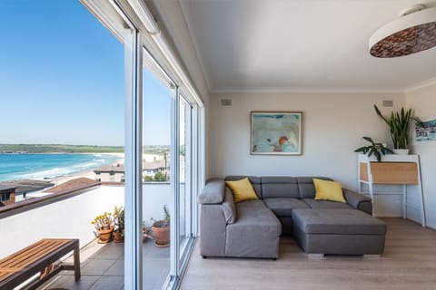 Stunning views of the beach and ocean from the living room and balcony