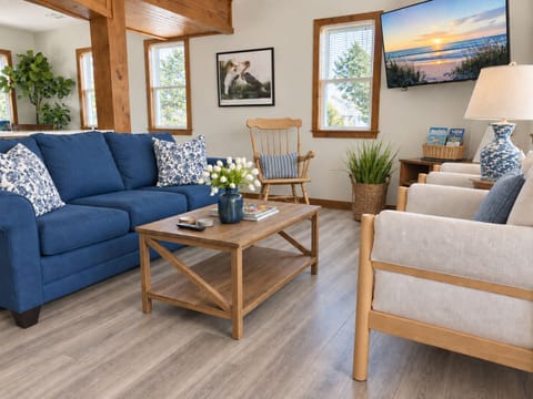 Comfort meets coastal charm. Kick back in this inviting living space after a day at the beach.
