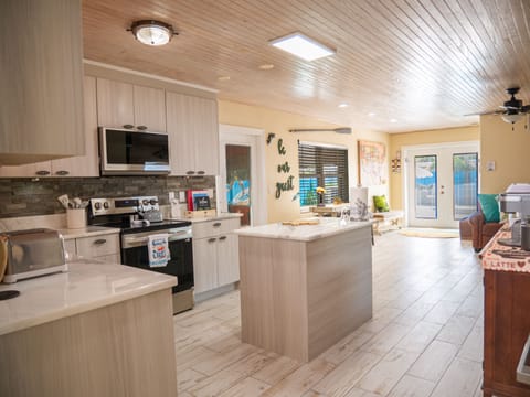 Updated kitchen off game room with Island.  Open concept throughout.