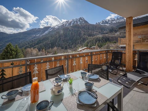 Table, Sky, Cloud, Property, Furniture, Tableware, Mountain, Chair, Tree, Wood