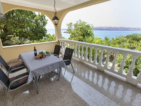 Furniture, Property, Plant, Table, Water, Building, Tree, Sky, Outdoor Furniture, Botany