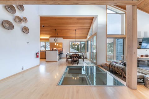 The main floor of the home features an open and social layout with the living room, dining room and kitchen seamlessly blending together.