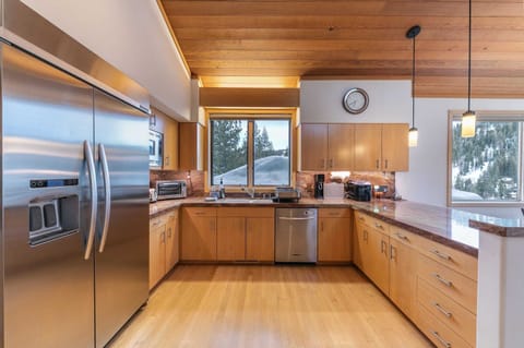 The fully equipped kitchen has everything you need to prepare meals for large groups with ample cabinet and counter space, and a full range of kitchen-aid appliances.