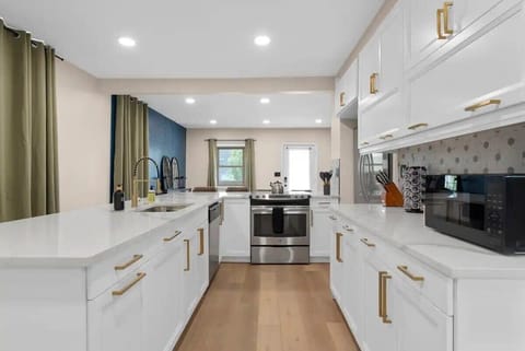 Fully stocked kitchen with high end appliances