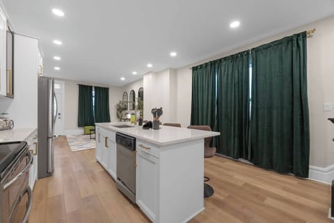 The kitchen island is perfect for serving breakfast or meal prep