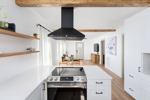 The kitchen is open concept to the dining space & living room