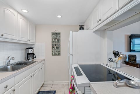 Open kitchen layout with full-size appliances