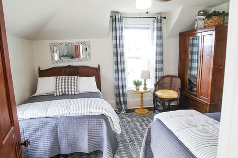 Upstairs bedroom with 2 full beds