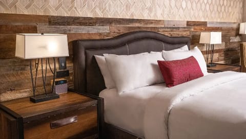 Sink into crisp linens and soft bedside lighting.