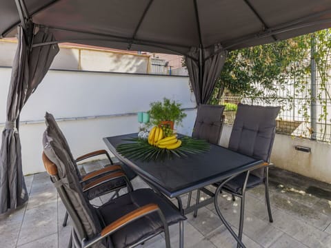 Table, Furniture, Chair, Plant, Wood, Shade, Outdoor Furniture, Interior Design, Rectangle, Building