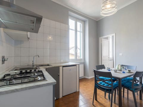 Sky, Plant, Cloud, Street Light, Urban Design, Road Surface, Tree, Building, Landscape, Road