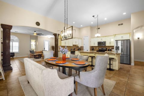 Dining area and open concept kitchen and living room