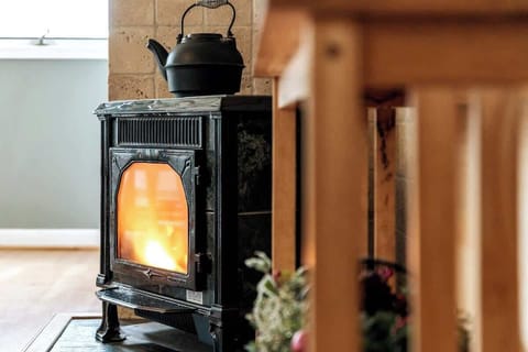 Fireplace details add warmth and charm to our living space, the perfect retreat after a chilly day on the slopes. 