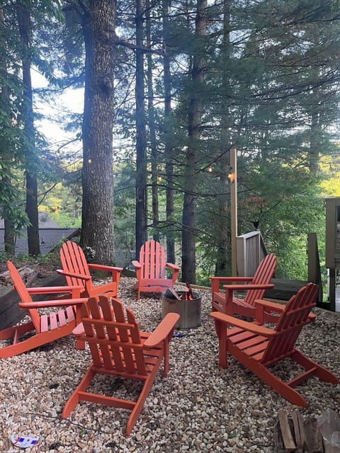 The recently installed fire pit area with outdoor lights is the perfect place to unwind with friends and family. 