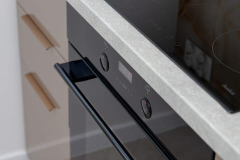  The kitchen's bright space is perfect for preparing meals. 