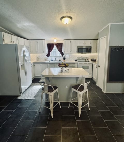 Fully stocked kitchen includes many cooking conveniences. 
