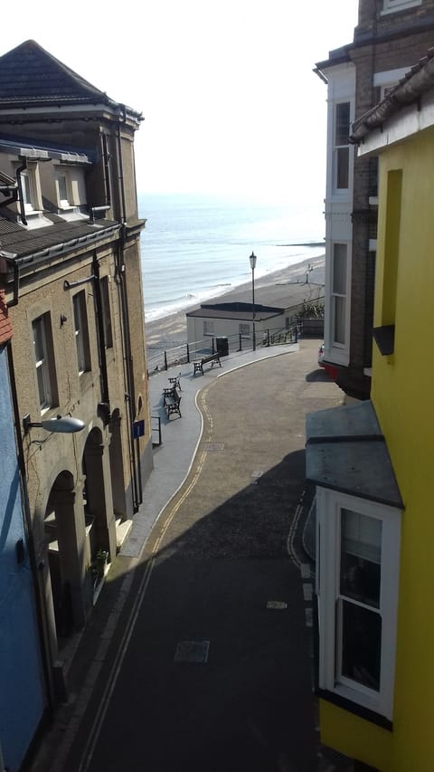 Overlooking the sea and down the steps to the beach
