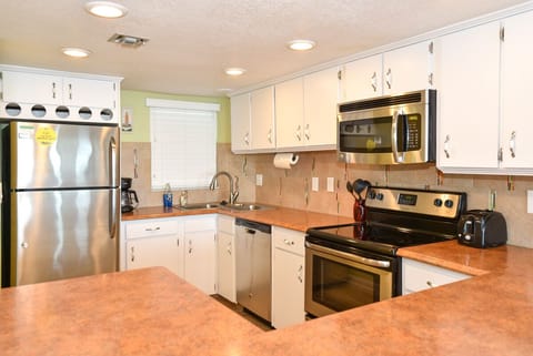 Kitchen with all stainless appliances.