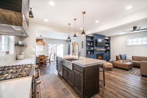 Amazing NEW kitchen. Quartz counters, GE Cafe Appliances, Dining Baguette.