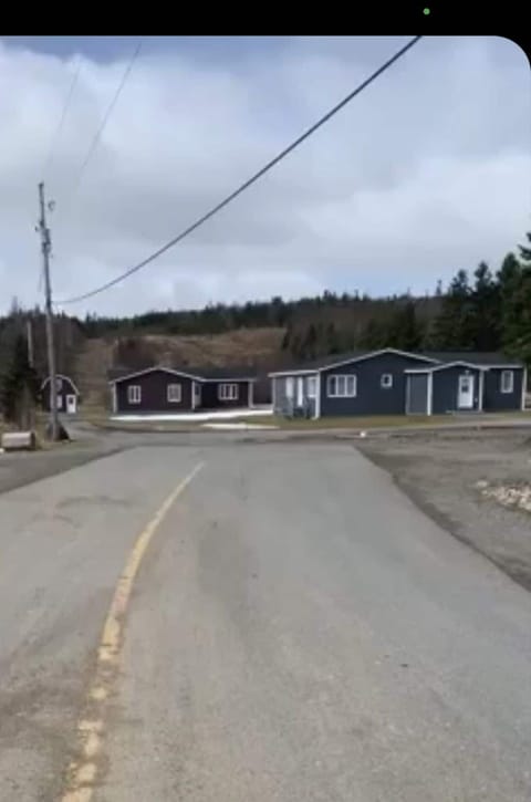 Front of House - fully paved road and the house is in a community.