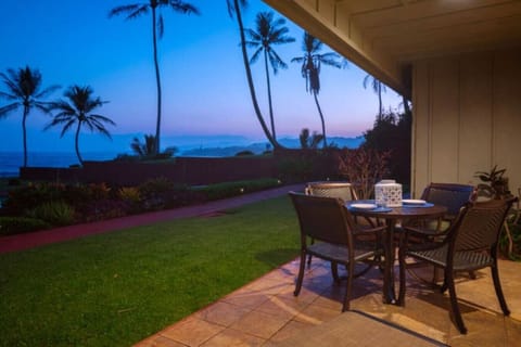 Covered patio area offering peaceful evening views of the coast.